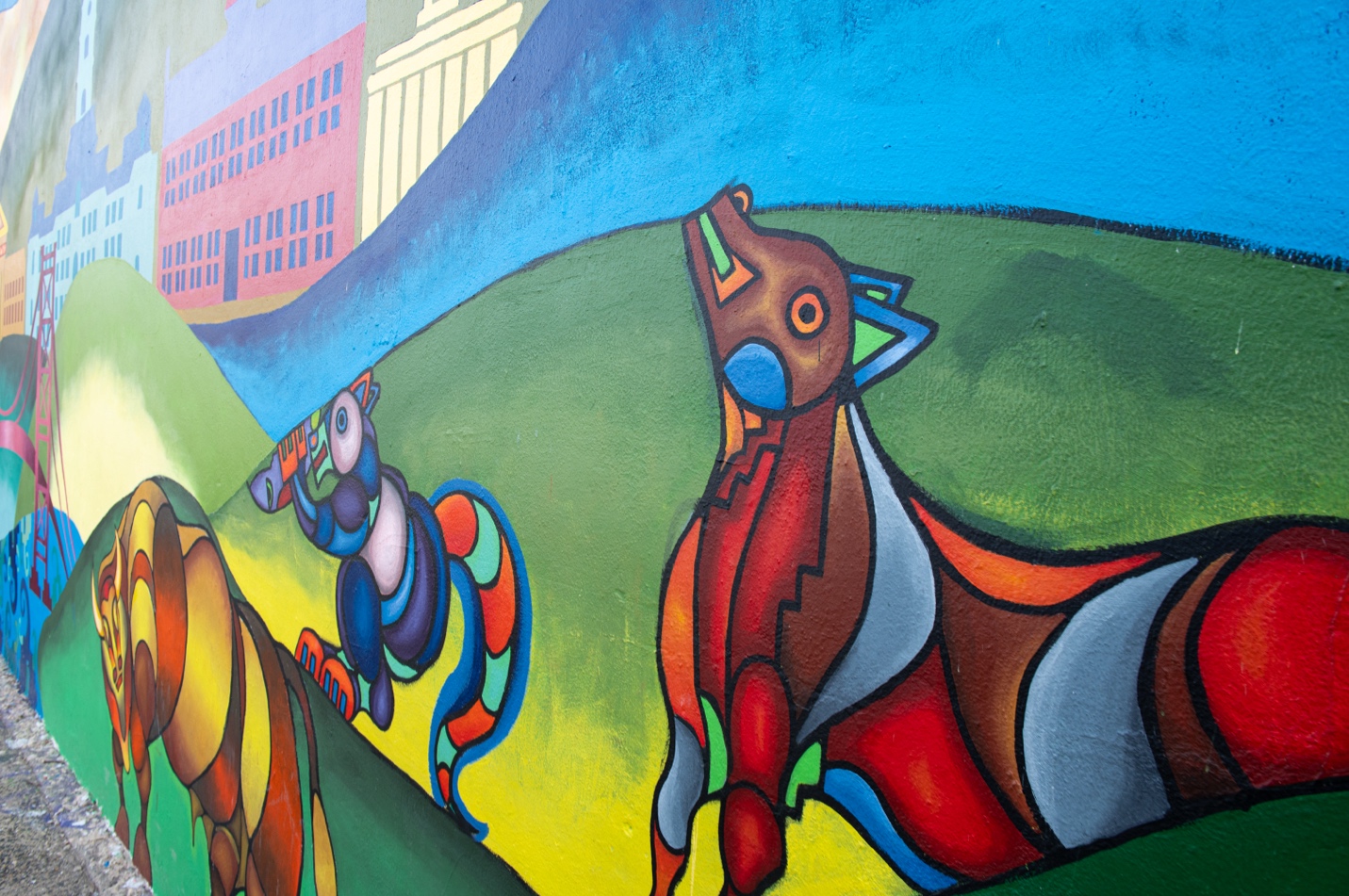 Images of animals on the Philadelphia side of the mural, including buffalo and squirrel. Photo by Erin Blewett.