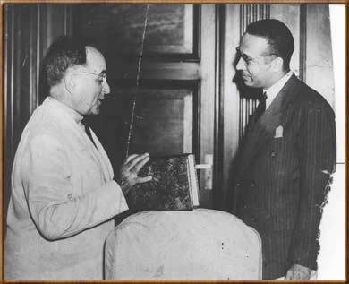 Image: Antônio Ferreira Cesarino Júnior (black professor at the University of São Paulo) presenting Getúlio Vargas with a copy of the Consolidation of Labor Laws (CLT), on which he worked as a labor lawyer. Collection of the Cesarino family.