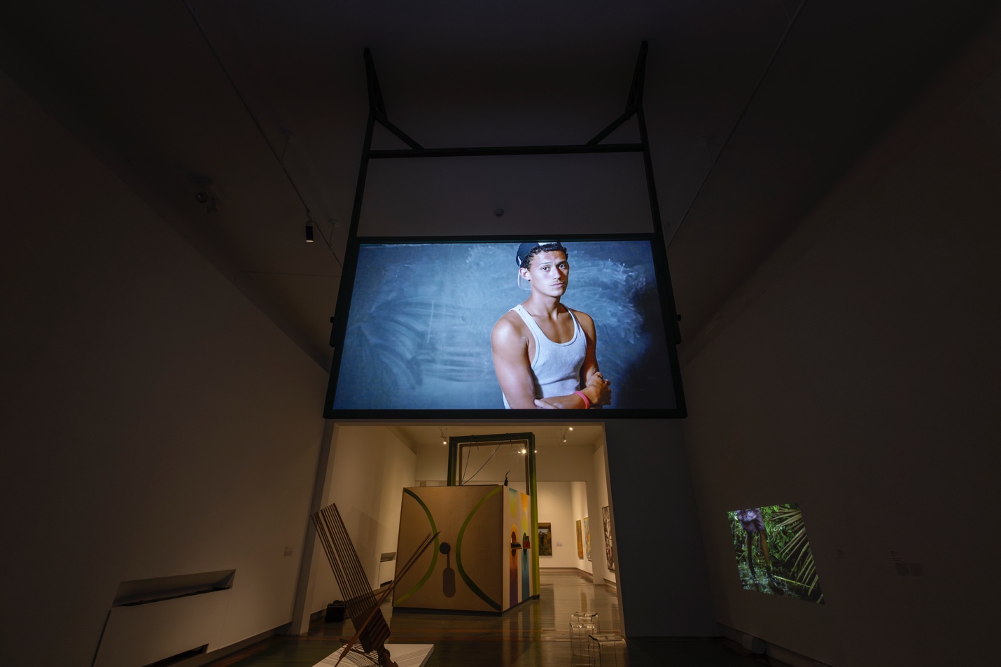 Puerto Rico Negrx exhibition view with the video ReForm (Jacob) by Pepón Osorio in the foreground. Photo by Raquel Pérez Puig.